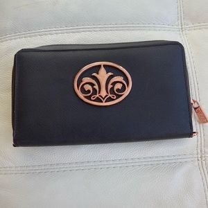 TYME Clutch, brand new